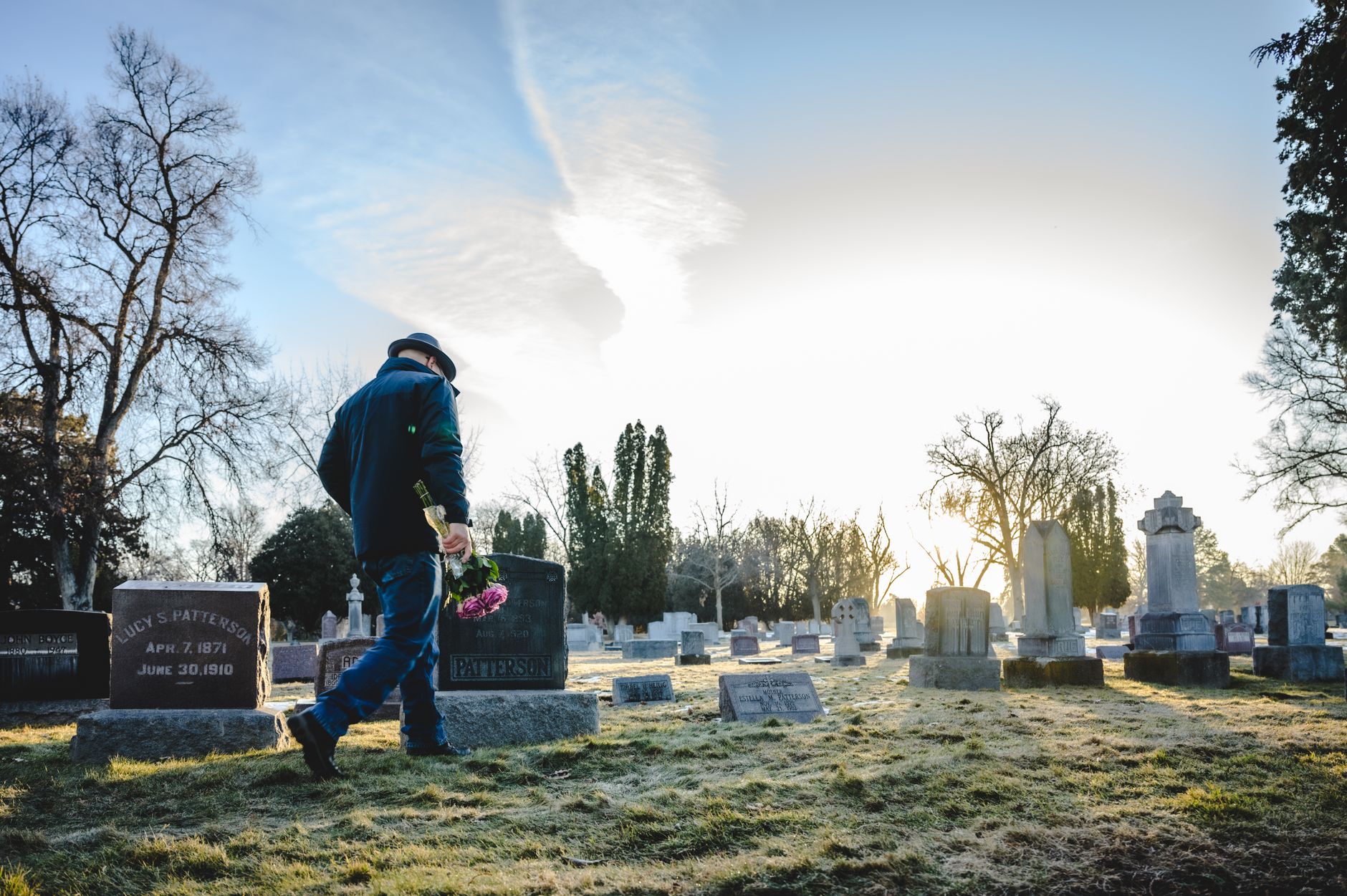 A quiet, well-kept cemetery on a clear day